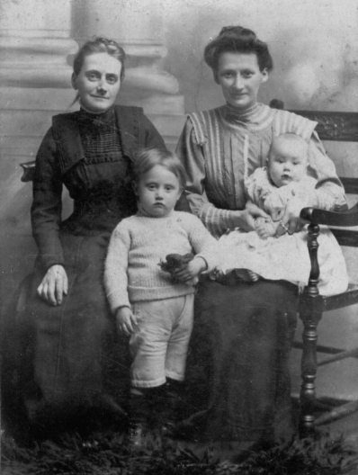 Maria Mitten with two of her children in 1910. On the left is Maria's sister-in-law Fanny Mitten. This photograph was taken at Studio of H. R. Marchant, Bohemia Road, St Leonards